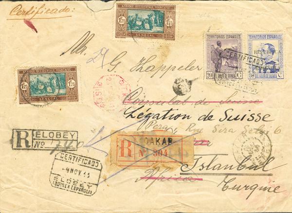 4563 - <i class="far fa-envelope"></i>  235, 240. 1935. 20 cts violeta y 80 cts azul. Certificado de ELOBEY (GUINEA ESPAÑOLA) a DAKAR (SENEGAL) y reexpedida a ESTAMBUL (TURQUIA) con sellos de Senegal. En el frente llegada a Dakar y al dorso a Estambul. MAGNIFICA Y ESPECTACULAR Y RARISIMO FRANQUEO MIXTO. - 175€